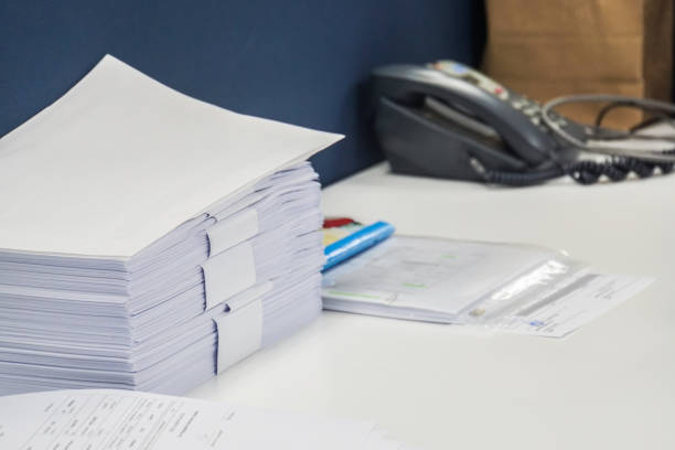 istock close up business documents sheet in office with landline phone 907916428