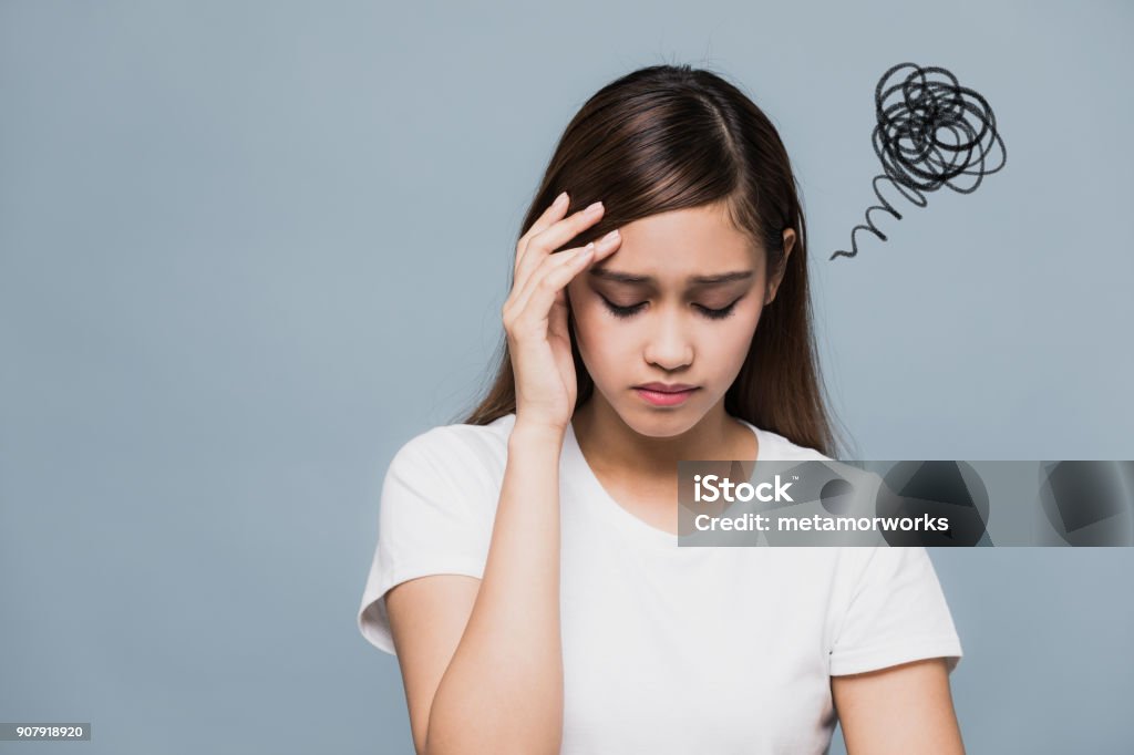 Depressed young woman. Emotional Stress Stock Photo