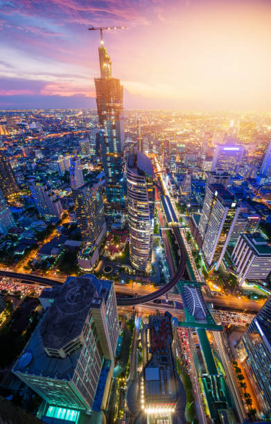 istock Panoramic view Cityscape business district from aerial view high building at dusk (Bangkok, Thailand) 907921342