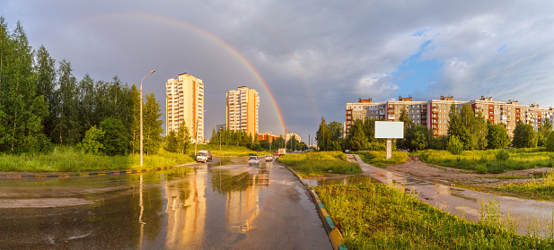 Rainbow over houses in the summer in Nizhny Novgorod, Russia