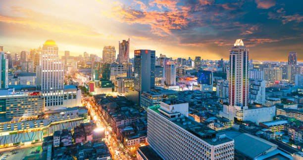 istock Panoramic view Cityscape business district from aerial view high building at dusk (Bangkok, Thailand) 907929002