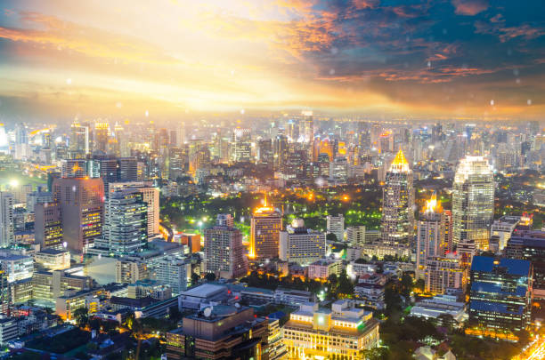 istock Panoramic view Cityscape business district from aerial view high building at dusk (Bangkok, Thailand) 907929036
