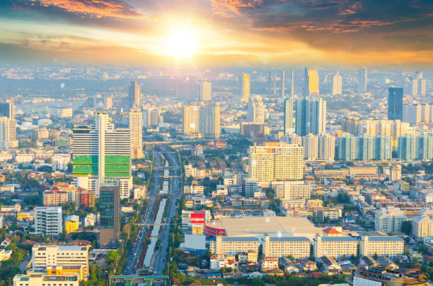 Panoramic view Cityscape business district from aerial view high building at dusk (Bangkok, Thailand)
