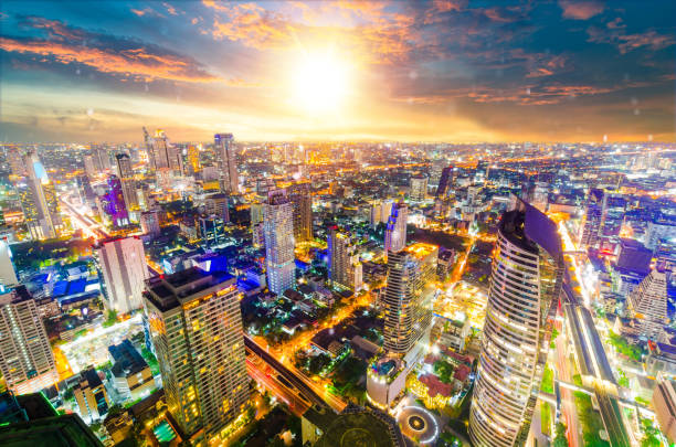 istock Panoramic view Cityscape business district from aerial view high building at dusk (Bangkok, Thailand) 907929372