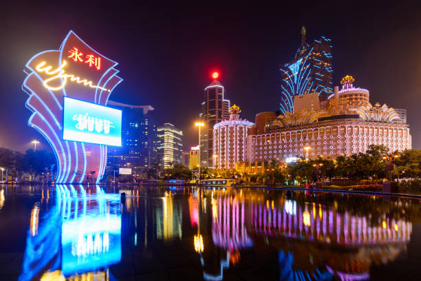 Macao, China - January 14,2018 Lisboa fire show and background of Macao Peninsula circular