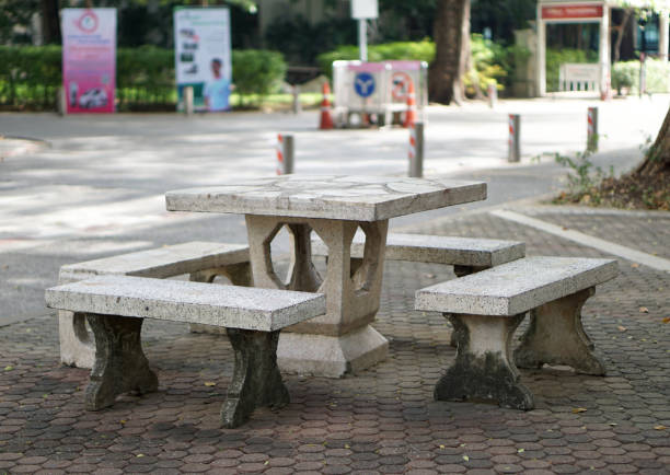 Old table and stone bench in the park