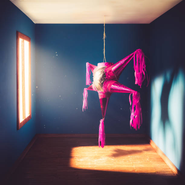 istock mexican pinata hanging in a room 907932988