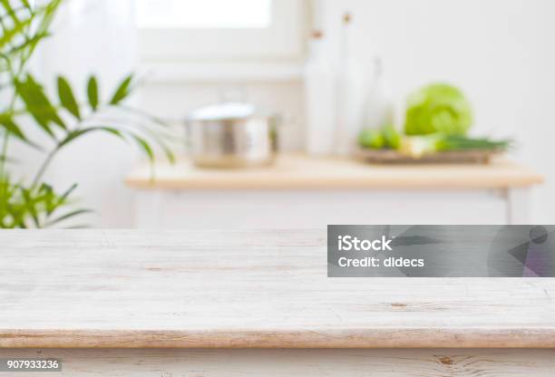 Table Top And Blurred Kitchen Room As Background Stock Photo - Download Image Now - Table, Kitchen, White Color