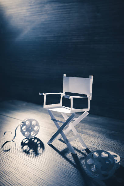 istock paper director chair on a blueish grey background 907936258