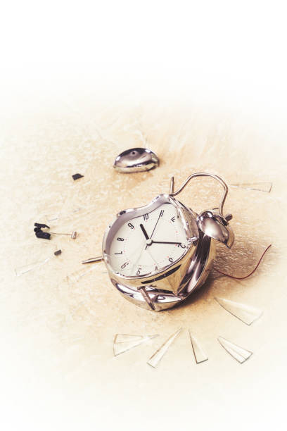 istock photo of a destroyed alarm clock 907936648
