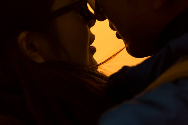 closeup of affectionate couple looking at each other.