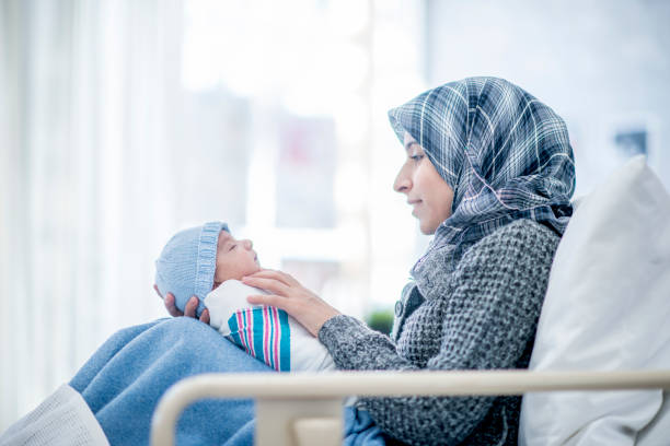 istock Mother And Newborn Son 907937130