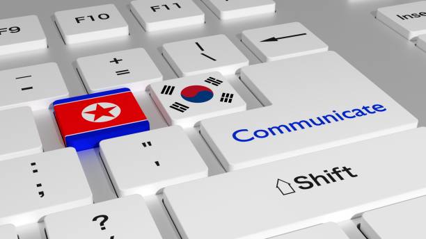 istock White keyboard with north and south korea key and the word communicate 907939584