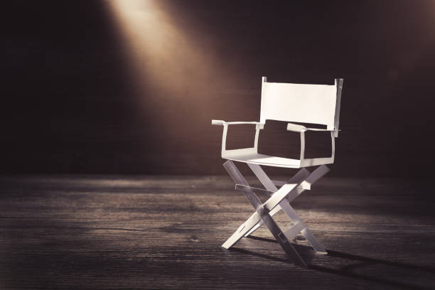 istock paper director chair on a blueish grey background 907939996