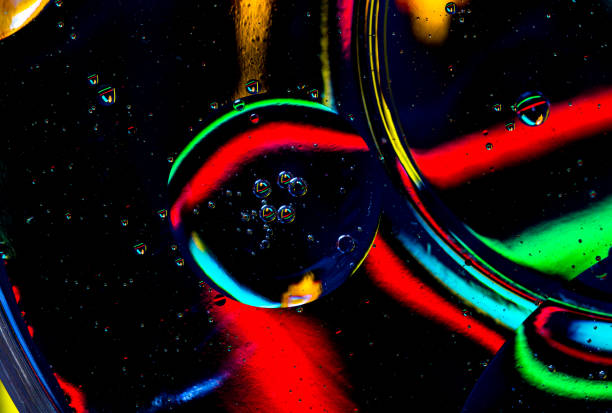 istock Abstract art background blue green red black color drops bubbles. 907940804