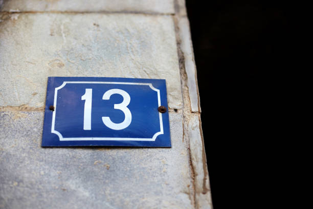 istock Unlucky house number thirteen. 907940844