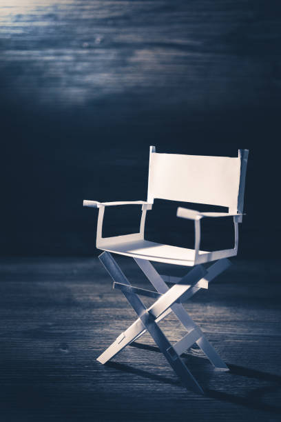istock paper director chair on a blueish grey background 907942892