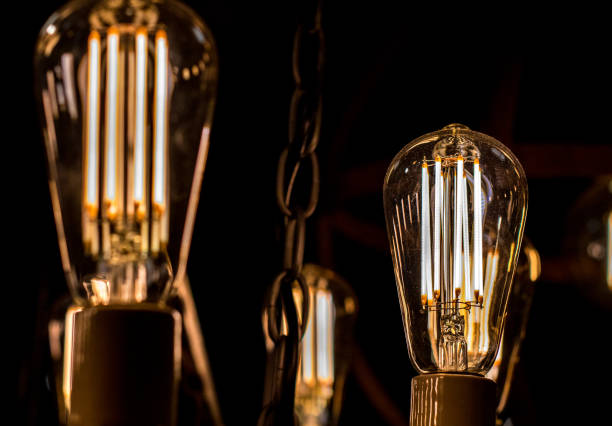 istock Contamplorary LED light bulds made to look like old school style light bulbs. Creating old style look and saving energy. 907946352