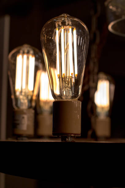 istock Contamplorary LED light bulds made to look like old school style light bulbs. Creating old style look and saving energy. 907946416