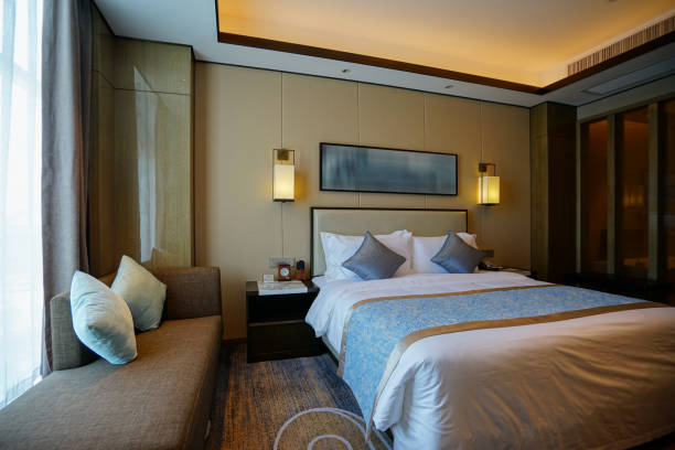 istock Elegant and comfortable bedroom interior 907946954