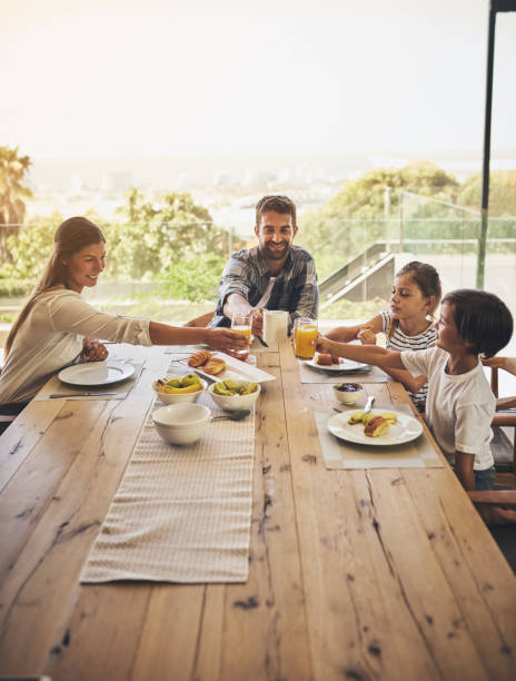 istock Time to dig in and enjoy a hearty breakfast together 907948516
