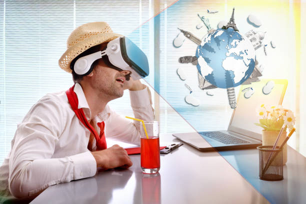istock Man at work imagining his vacation with vr glasses representation 907949026