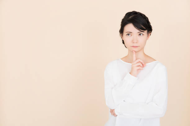 問題を抱えた若い女性 - 上半身 ストックフォトと画像