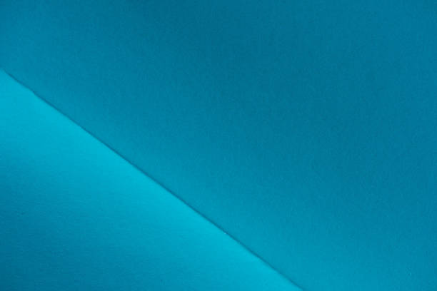 istock close-up shot of folded blue paper for background 907951972