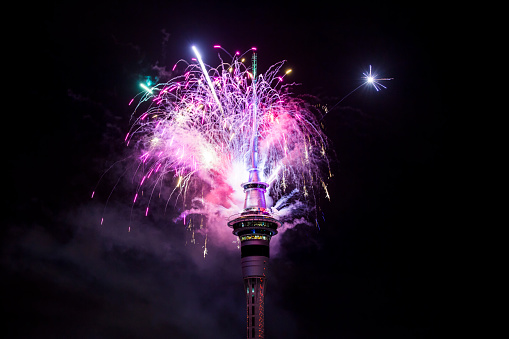 Auckland, New Zealand - January 01, 2018: New Year Fireworks thrown from Auckland Skytower at midnight