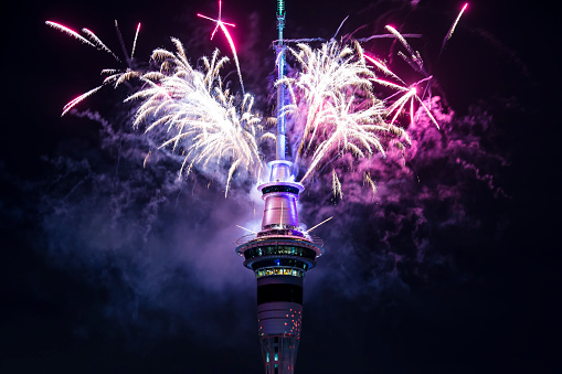 Auckland, New Zealand - January 01, 2018: New Year Fireworks thrown from Auckland Skytower at midnight