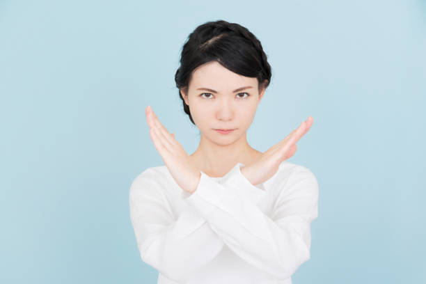 istock Young woman making a stop sign 907955032