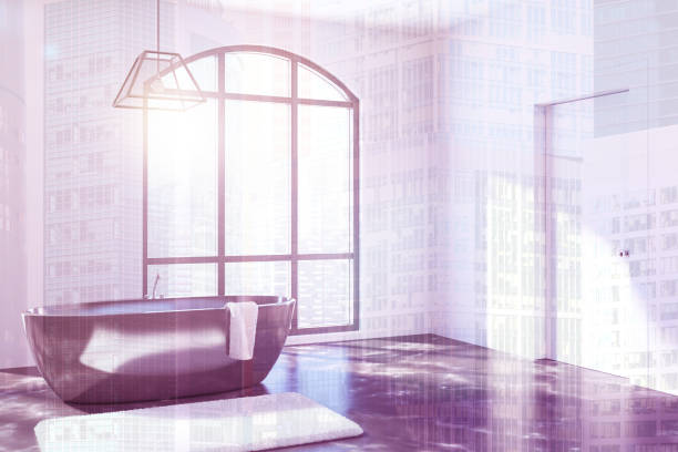 istock White bathroom, black tub toned 907955038