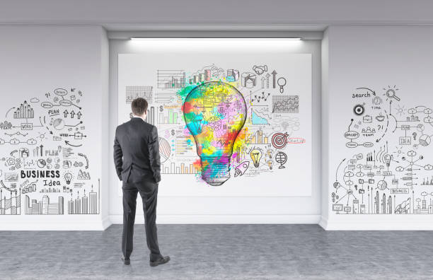 istock Businessman, rear view, business idea 907955758