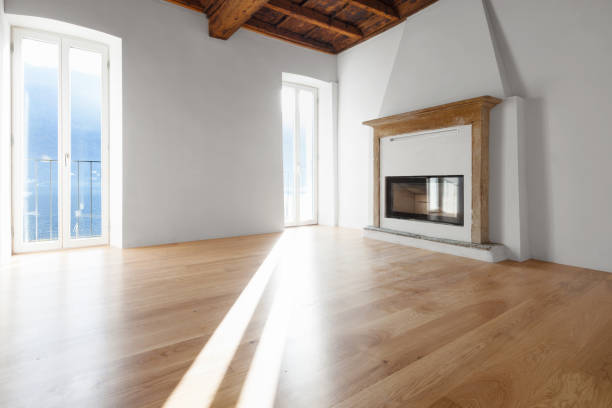 istock Living room with windows overlooking the lake. Fireplace. 907961002