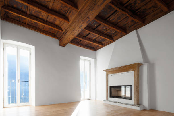 istock Living room with windows overlooking the lake. Fireplace. 907961086