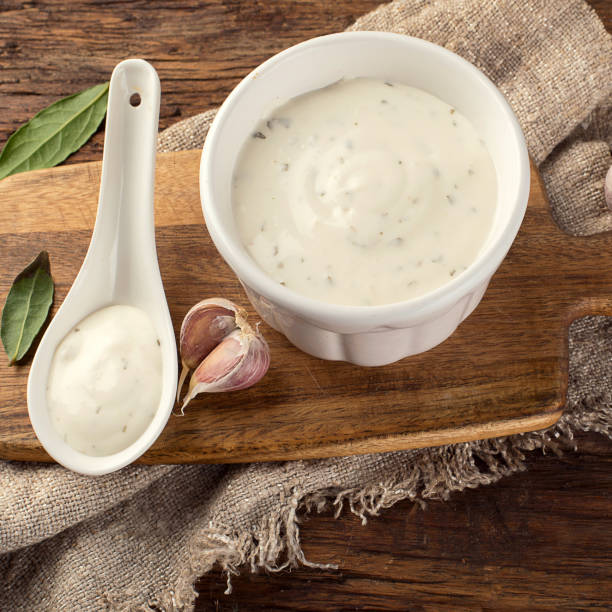 istock Bowl of Garlic sauce or mayonnaise 907961380