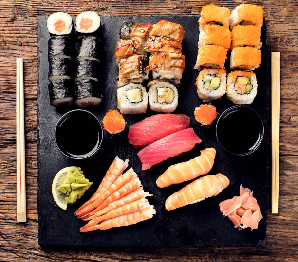 istock Sushi Set nigiri, sushi rolls and sashimi 907961518