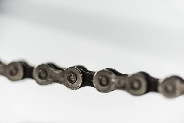 istock close up of bicycle metal chain on white 907963336