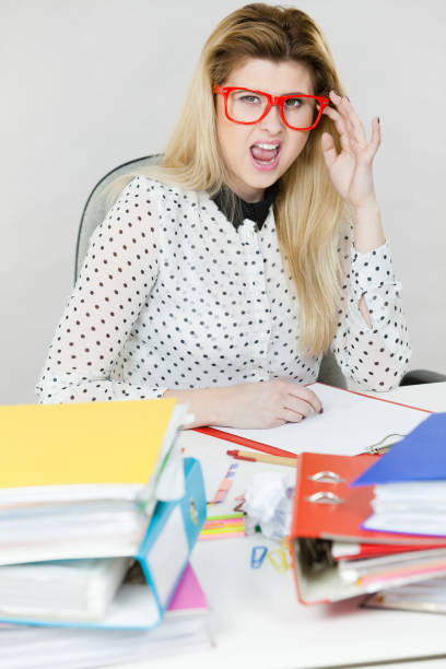 istock Happy business woman in office 907963692