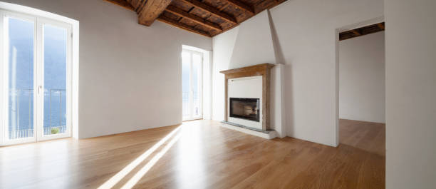 istock Living room with windows overlooking the lake. Fireplace. 907965014