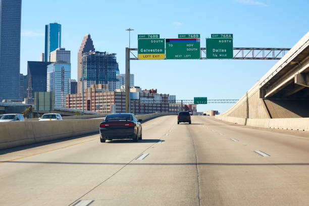 istock Houston texas downtown road sign US 907965390