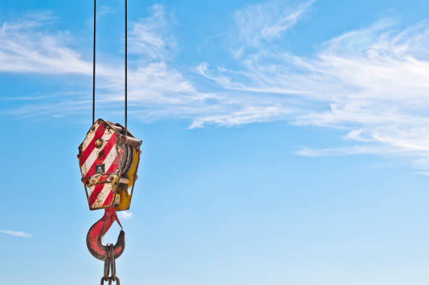 istock Lifting hook crane and chain links. Lifting hook for heavy loads. 907965482