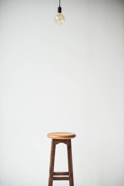 istock wooden chair and lamp isolated on white 907965578