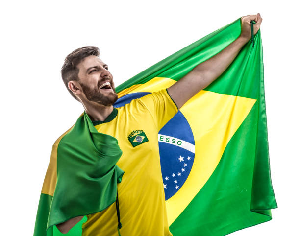 brazilian male athlete / fan celebrating on white background - fan sport football male imagens e fotografias de stock