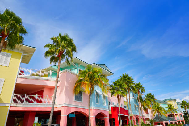 Florida Fort Myers colorful palm trees facades Florida Fort Myers colorful facades and palm trees in USA fort myers photos stock pictures, royalty-free photos & images