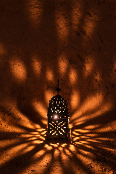 istock Arabic lamp with beautiful lights in the background. Vintage lantern 907972358
