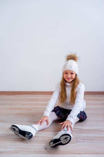 istock Girl on ice skates 907978660