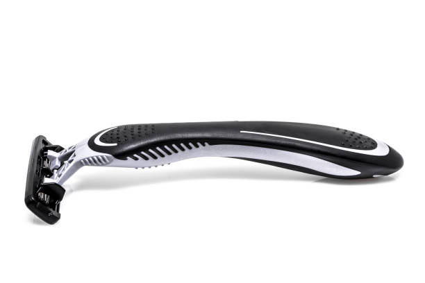 istock Black and gray shaving Razor Over White Background. 907988150