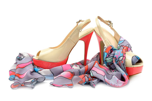 istock Elegant sandals and scarf isolated on white background. Free space for text. 907990224