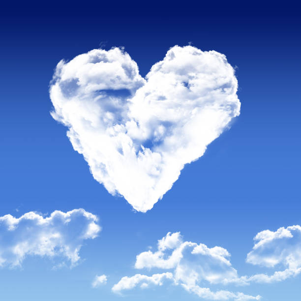 istock heart shaped cloud in the blue sky 907992094